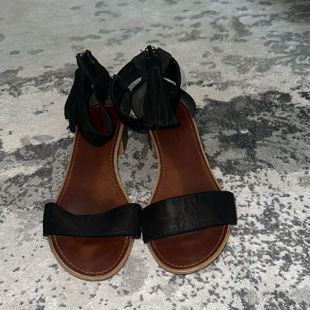 Rock & Candy Black suede tassle ankle strap low heeled sandals